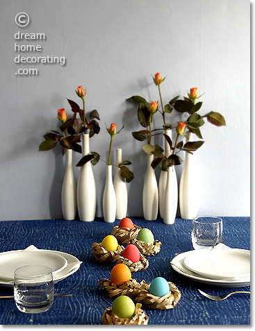 Easter dinner table decoration with kraft-paper Easter nests