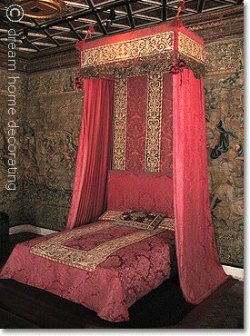 red half-tester bed in Chenonceau castle, France