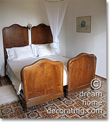 wooden beds in a Tuscan bedroom